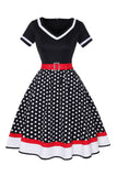 Sort Polka Dots med V-hals Kjole fra 1950'erne