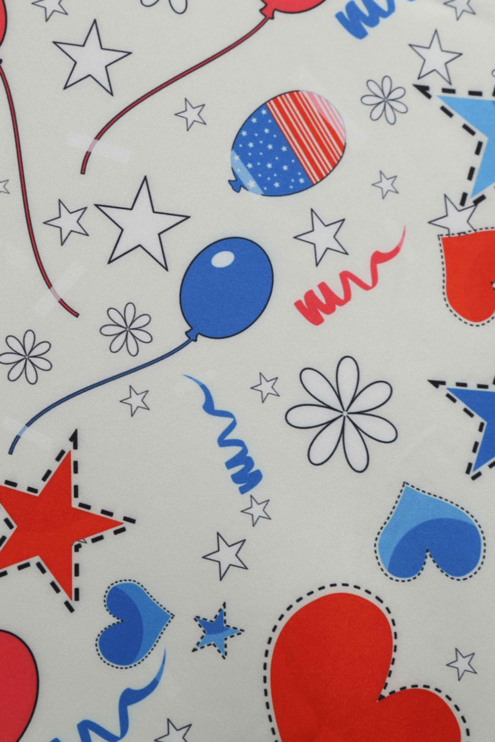 Sort trykt ærmeløs kjole fra 1950'erne med bælte