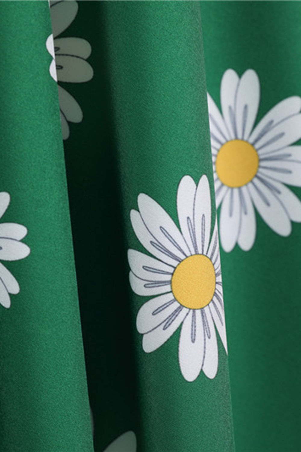 Ærmeløs trykt gul kjole fra 1950'erne