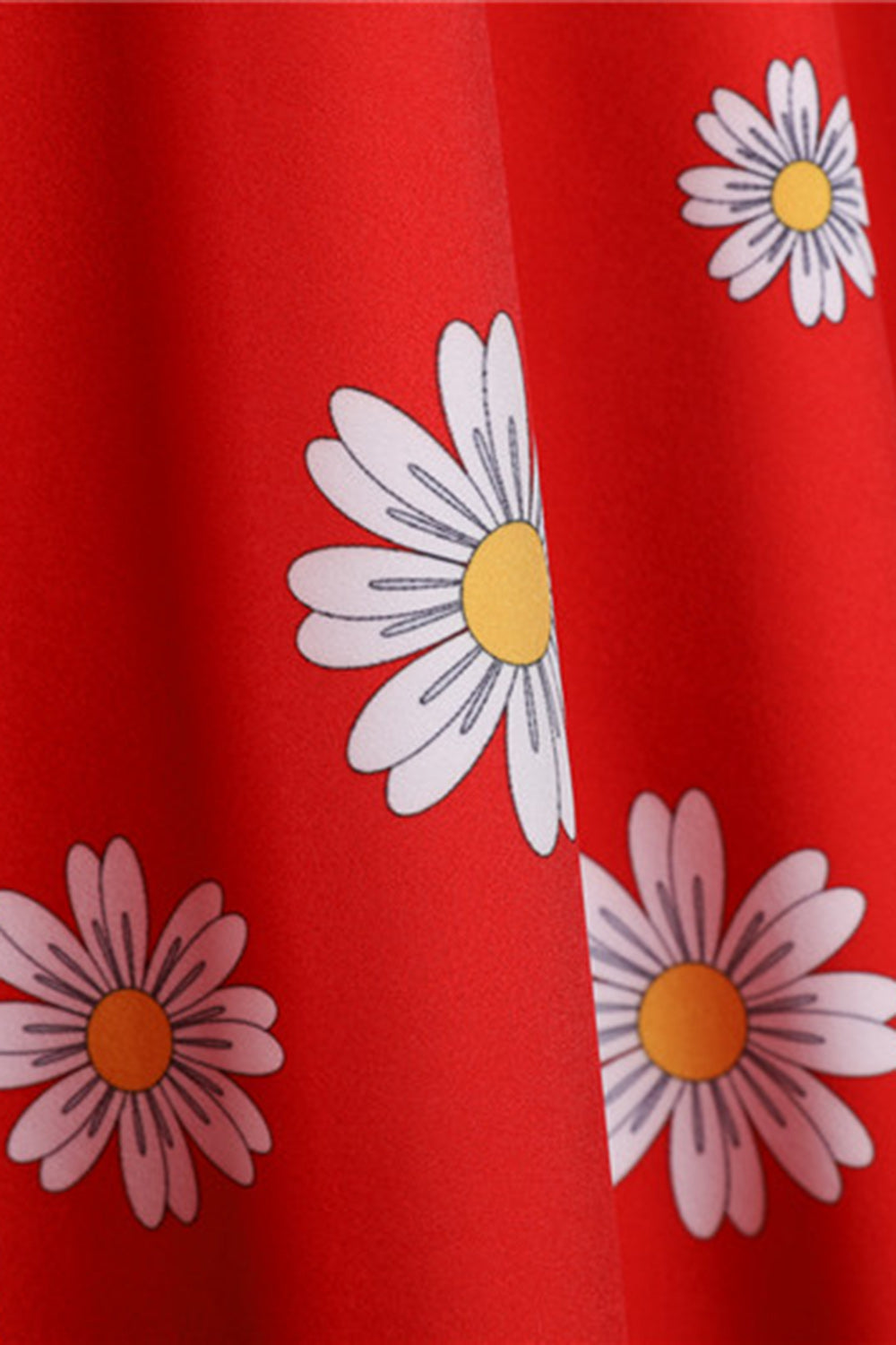 Ærmeløs trykt gul kjole fra 1950'erne