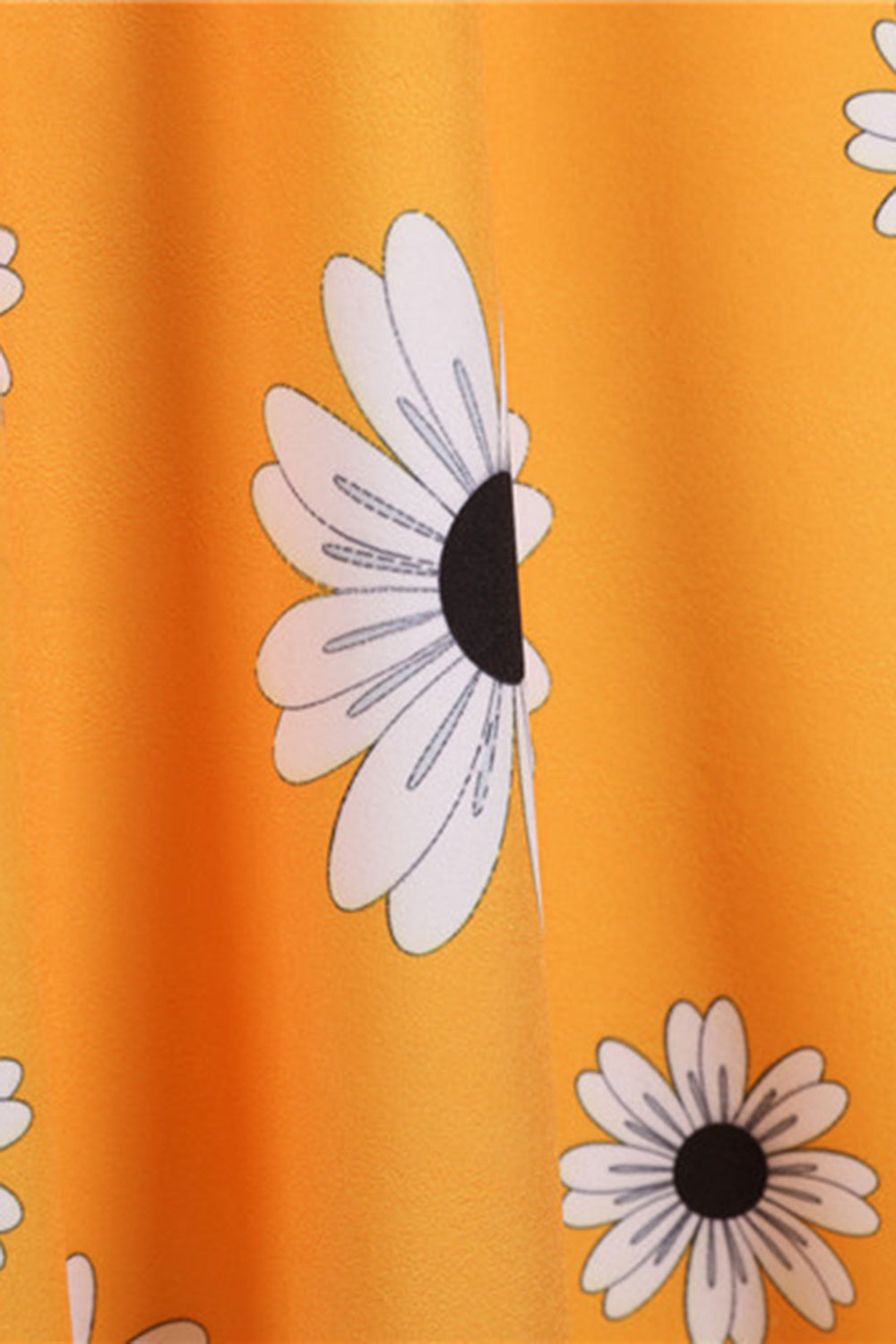 Ærmeløs trykt gul kjole fra 1950'erne