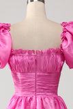 Pufærmer Hot Pink gallakjole med flæser
