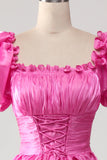 Pufærmer Hot Pink gallakjole med flæser