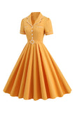 Blå A Line revers vintage 1950'er kjole med knapper