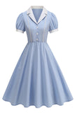 Noteret revers blå A-linje enkeltradet kjole fra 1950'erne