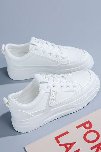 Hvide flade afslappede sneakers
