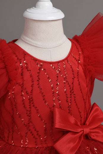 En rød pigekjole med juvelhals og bueknude
