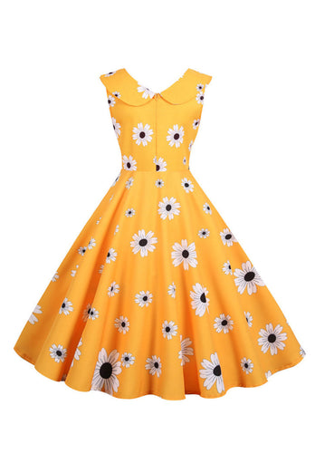 Ærmeløs trykt gul kjole fra 1950'erne