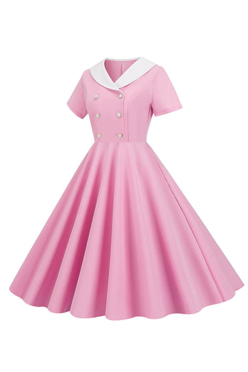 En linje pink kort ærmeløs kjole fra 1950'erne
