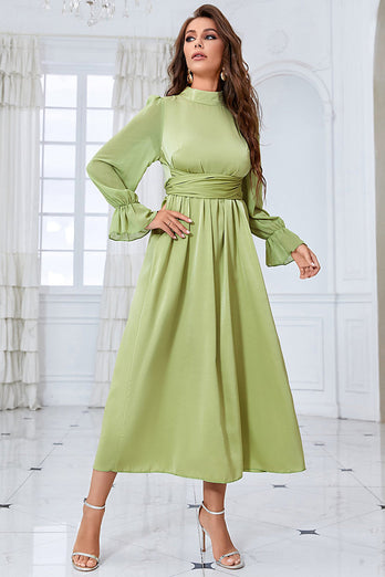 En linje grøn langærmet afslappet kjole