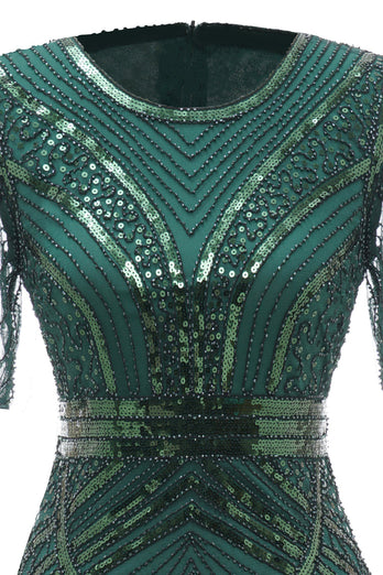 Mørkegrøn kortærmet kjole fra 1920'erne med frynser