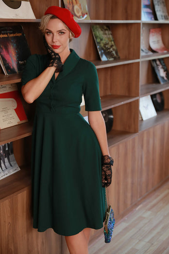 Mørkegrøn vintage kjole fra 1950'erne med ærmer